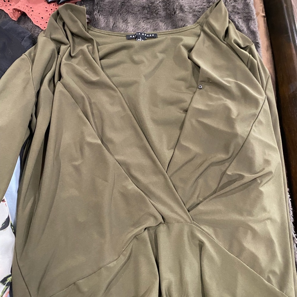 Olive green onesie however the onesie button is torn
